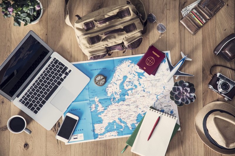A world map with multiple destination markers, illustrating a well-planned multi-destination trip itinerary.