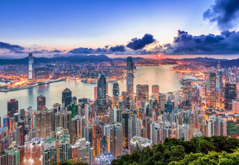 A stunning view of Hong Kong’s skyline from Victoria Peak at sunset.